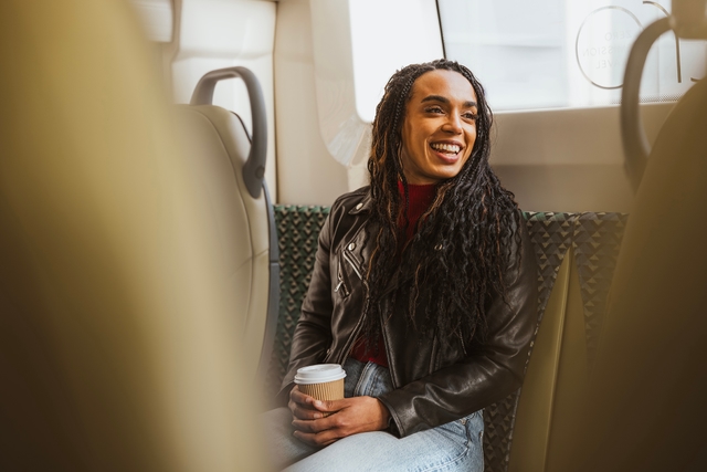 Woman sitting on a bus